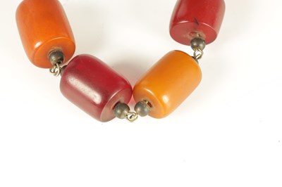 Lot 244 - AN AMBER BEAD NECKLACE
