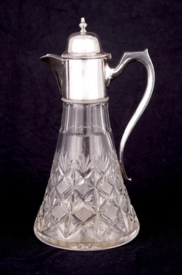 Lot 298 - A LATE 20TH CENTURY CUT GLASS SILVER CLARET JUG