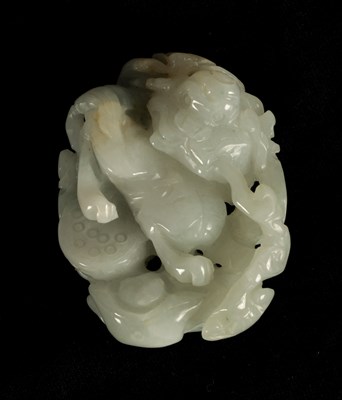 Lot 62 - A CHINESE WHITE JADE CARVED AND PIERCED PENDANT