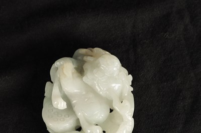 Lot 62 - A CHINESE WHITE JADE CARVED AND PIERCED PENDANT