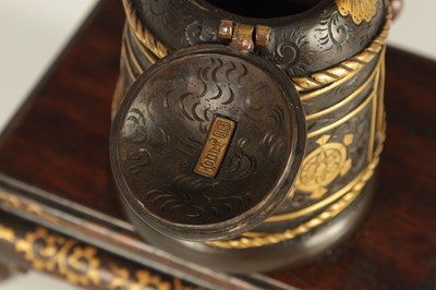 Lot 202 - A MEIJI PERIOD JAPANESE MIYAO BRONZE AND GILT ENGRAVED INKSTAND