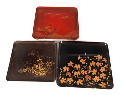 Lot 218 - A GROUP OF THREE LATE 19TH CENTURY JAPANESE COLOURED LACQUERWORK SQUARE TRAYS
