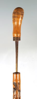Lot 372 - A LATE 19TH CENTURY CHINESE CARVED BAMBOO SWORD STICK