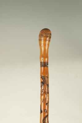 Lot 372 - A LATE 19TH CENTURY CHINESE CARVED BAMBOO SWORD STICK