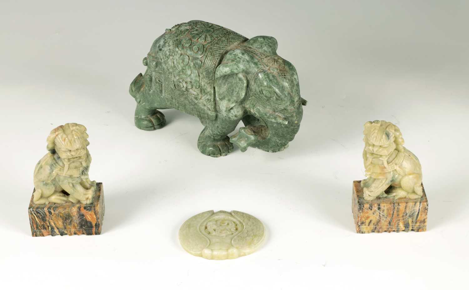 Lot 122 - A 20TH CENTURY LARGE CARVED SPINACH GREEN JADE ELEPHANT