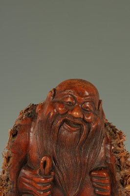 Lot 183 - A 19TH CENTURY CHINESE CARVED BAMBOO ROOT FIGURE OF A SAGE