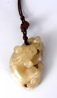Lot 104 - A 16th/17th CENTURY CHINESE JADE PENDANT...