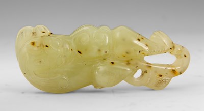 Lot 106 - A 19TH CENTURY GREEN JADE PENDENT depicting a...