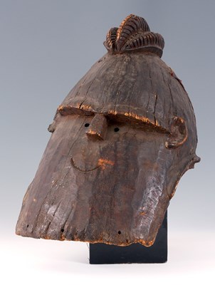 Lot 415 - A 19th CENTURY NIGERIAN HARDWOOD HELMET MASK...