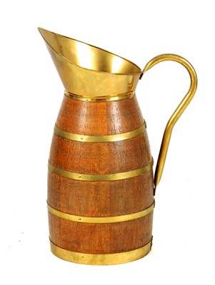 Lot 559 - A LATE 19TH CENTURY OAK BRASS BOUND WATER JUG