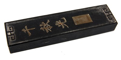 Lot 116 - AN ANTIQUE CHINESE IMPERIAL INKSTICK one side...