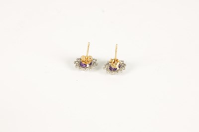 Lot 251 - A PAIR OF LADIES 9CT GOLD AMETHYST AND DIAMOND EARINGS