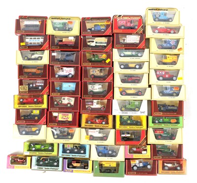 Lot 433 - A LARGE COLLECTION OF MATCHBOX MODELS OF YESTERYEARS ADVERTISING COMMERCIAL VEHICLES AND TAXIS