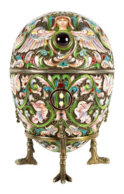 Lot 273c - A FINE EARLY 20TH CENTURY RUSSIAN RAISED ENAMEL WORK ON SILVER EGG WITH GILT INTERIOR