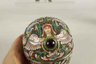 Lot 273 - A FINE EARLY 20TH CENTURY RUSSIAN RAISED ENAMEL WORK ON SILVER EGG WITH GILT INTERIOR