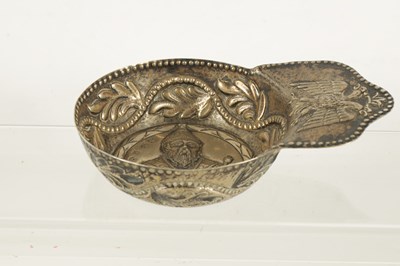 Lot 273 - AN 18TH CENTURY CONTINENTAL SILVER SHALLOW SIDE-HANDLED BOWL POSSIBLY RUSSIAN