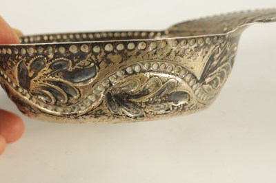Lot 273 - AN 18TH CENTURY CONTINENTAL SILVER SHALLOW SIDE-HANDLED BOWL POSSIBLY RUSSIAN