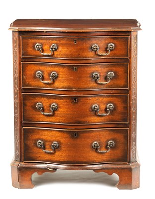 Lot 728 - A 20TH CENTURY MAHOGANY SERPENTINE CHEST OF DRAWERS