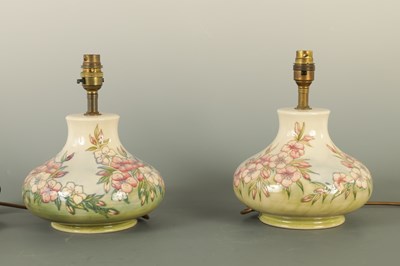 Lot 61 - A PAIR OF MOORCROFT LAMPS IN THE SPRING BLOSSOM DESIGN