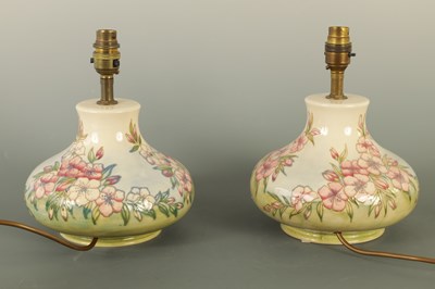 Lot 61 - A PAIR OF MOORCROFT LAMPS IN THE SPRING BLOSSOM DESIGN