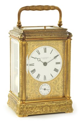 Lot 9 - A LATE 19TH CENTURY FRENCH ENGRAVED GILT BRASS GORGE CASE REPEATING CARRIAGE CLOCK