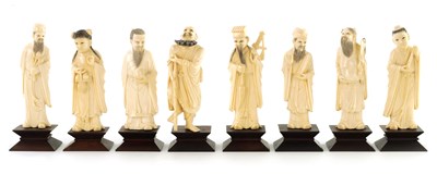 Lot 117 - A COMPLETE SET OF EIGHT MEIJI PERIOD JAPANESE IVORY CARVED OKIMONOS