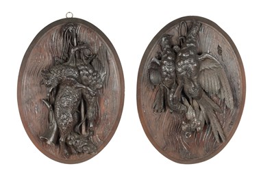 Lot 390 - AN PAIR OF LATE 19TH CENTURY CARVED BLACK FOREST WALL PLAQUES