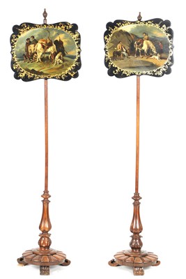 Lot 1048 - A PAIR OF 19TH CENTURY ROSEWOOD POLE SCREENS WITH LACQUERED PAPIER MACHE POLE SCREENS AFTER EDWIN LANDSEER