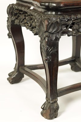 Lot 103 - A 19TH CENTURY CHINESE HARDWOOD AND MARBLE SHAPED JARDINIERE STAND