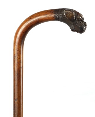 Lot 294 - A 19TH CENTURY CROOK HANDLED WALKING STICK WITH CARVED BULLDOG HEAD HANDLE