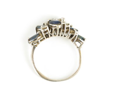 Lot 173 - AN 18CT WHITE GOLD DIAMOND AND SAPPHIRE CLUSTER RING