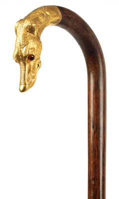 Lot 299 - A 19TH CENTURY ROSEWOOD AND GOLD METAL WALKING STICK