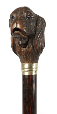 Lot 295 - A LATE 19TH CENTURY AUTOMATON DOGS HEAD WALKING STICK