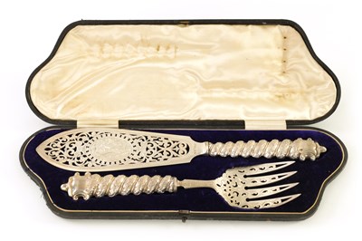 Lot 221 - A FINE VICTORIAN CASED PAIR OF SILVER FISH SERVERS