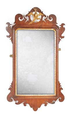 Lot 1085 - A GEORGE III MAHOGANY HANGING MIRROR