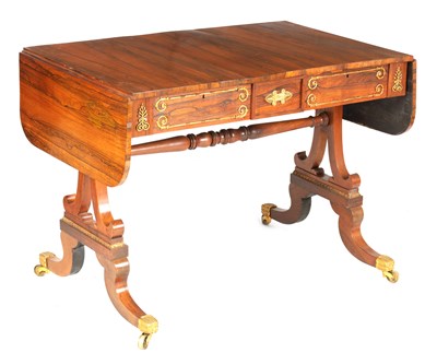 Lot 987 - A REGENCY BRASS MOUNTED FIGURED ROSEWOOD SOFA TABLE