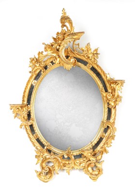 Lot 691 - A 19TH CENTURY CARVED GILT GESSO ROCOCO STYLE HANGING MIRROR