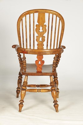 Lot 1096 - A PAIR OF 19TH CENTURY ASH AND ELM HIGH BACK BROAD ARM WINDSOR CHAIRS