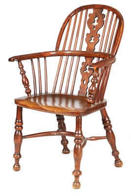 Lot 1065 - A 19TH CENTURY NOTTINGHAMSHIRE YEW WOOD LOW BACK WINDSOR ARMCHAIR