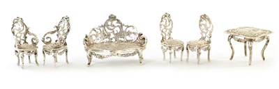 Lot 240 - A SUITE OF LATE 19TH CENTURY DUTCH SILVER MINIATURE FURNITURE