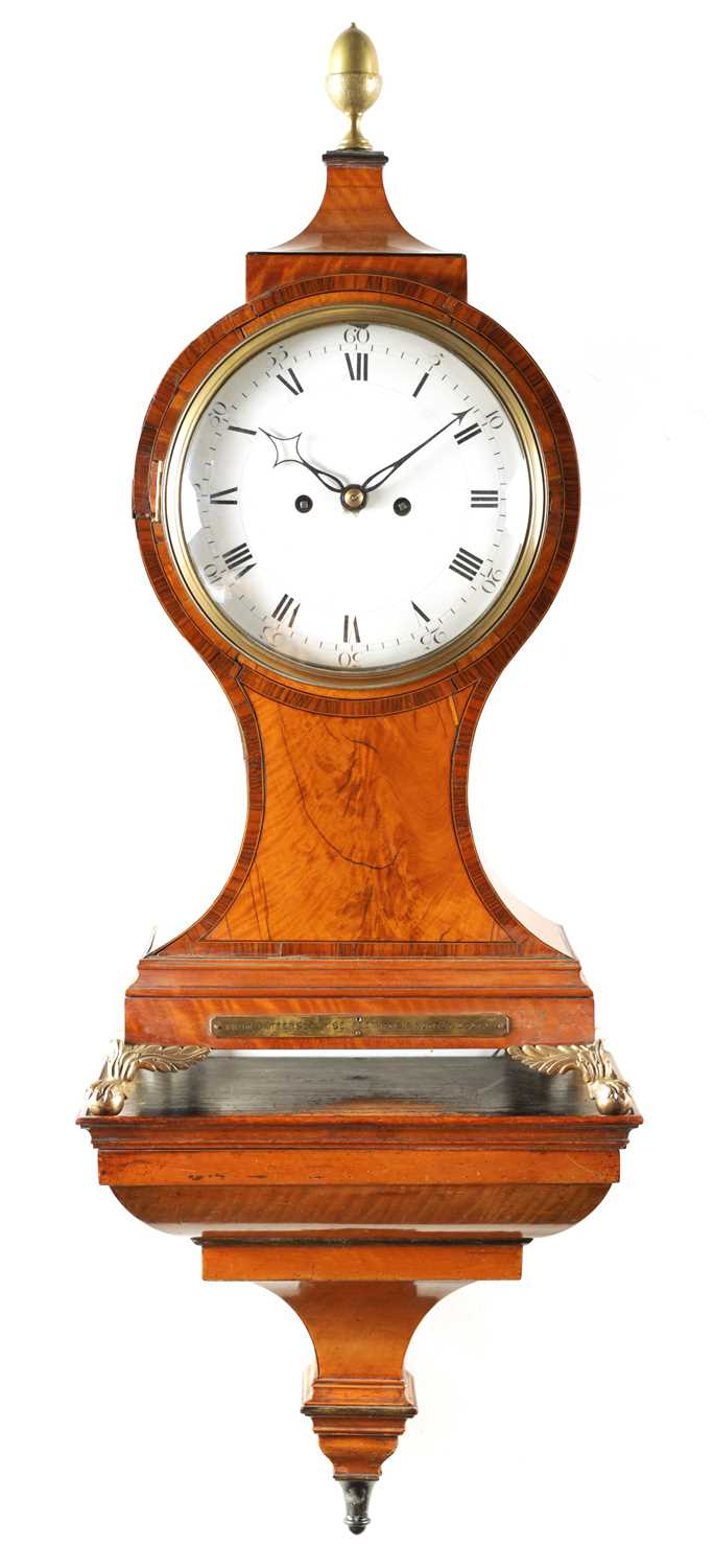 Lot 95 - WRIGHT IN THE POULTRY, WATCHMAKER TO THE KING. A GEORGE III SATINWOOD BALLOON SHAPED BRACKET CLOCK of large size, complete with WALL BRACKET