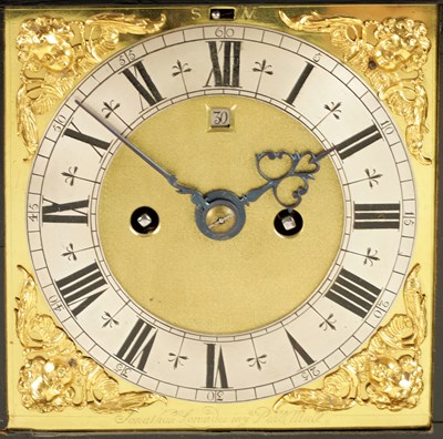 Lot 60 - JONATHAN LOWNDES IN YE PALL MALL, (LONDON).  A WILLIAM AND MARY EBONY VENEERED GILT BRASS MOUNTED BASKET TOP BRACKET CLOCK CIRCA 1685