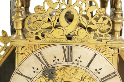 Lot 90 - THOMAS TAYLOR IN HOLBORN.  A LATE 17TH CENTURY WINGED BRASS LANTERN CLOCK