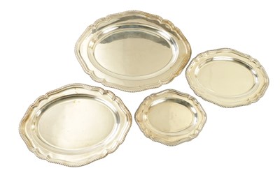 Lot 247 - A SET OF FOUR REGENCY SILVER PLATE SCALLOP-EDGE OVAL SERVING DISHES BY MATTHEW BOULTON