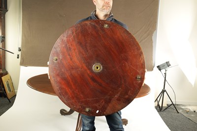 Lot 772 - A RARE LATE GEORGE III REGENCY FIGURED MAHOGANY CIRCULAR DINING TABLE OF LARGE SIZE FITTED WITH A REVOLVING SILVER GALLERIED LAZY SUSAN CENTRE BY MATTHEW BOULTON