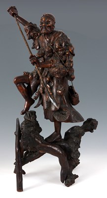 Lot 176 - A 19TH CENTURY CHINESE ROOT CARVED FIGURE OF A...