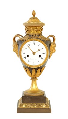 Lot 583 - AN EARLY 19TH CENTURY BRONZE AND GILT BRONZE FRENCH URN SHAPED MANTEL CLOCK