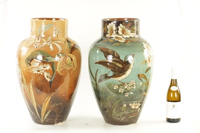 Lot 15 - A MASSIVE MATCHED PAIR OF 19TH CENTURY CERAMIC TAPERING SHOULDERED VASES