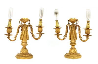 Lot 378 - A PAIR OF GILT BRASS ADAM STYLE DOUBLE BRANCH CANDELABRA