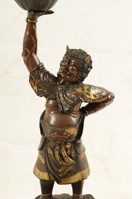Lot 153 - A LARGE 19TH CENTURY JAPANESE MEIJI PERIOD MIXED METAL PATINATED BRONZE MODEL OF AN ONI HOLDING A GONG